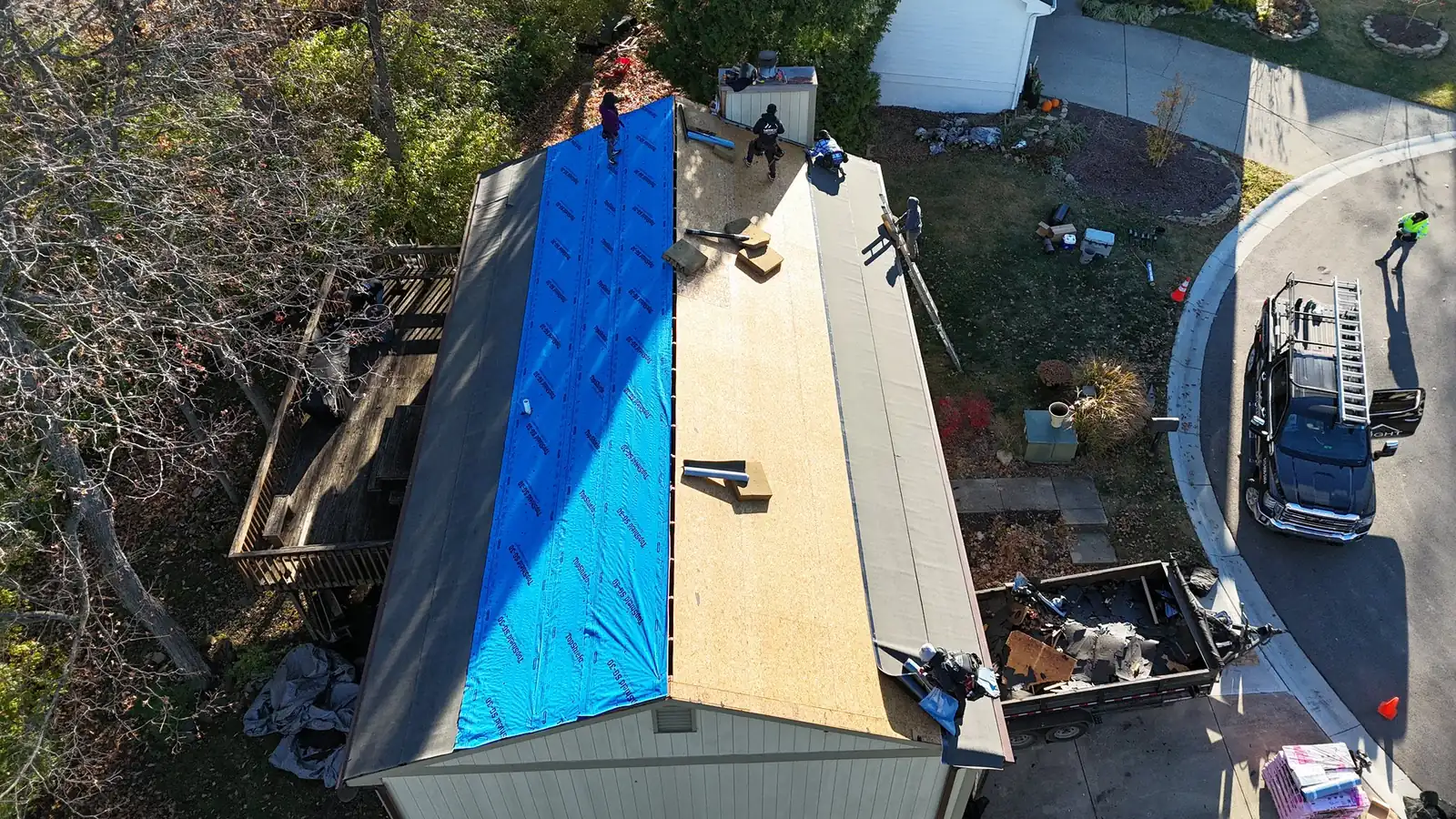 317 Restoration crew working on a roof replacement in Indianapolis