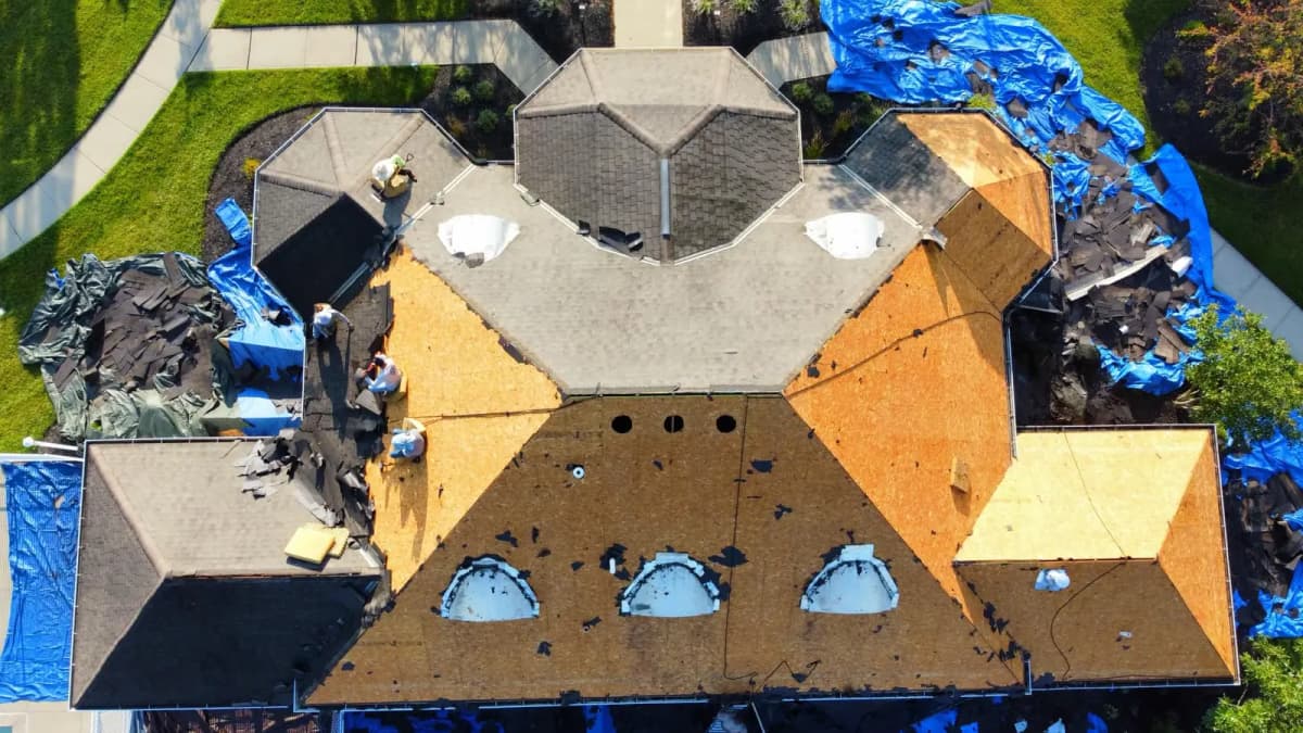 Aerial view of an Indianapolis roof tear-off in progress