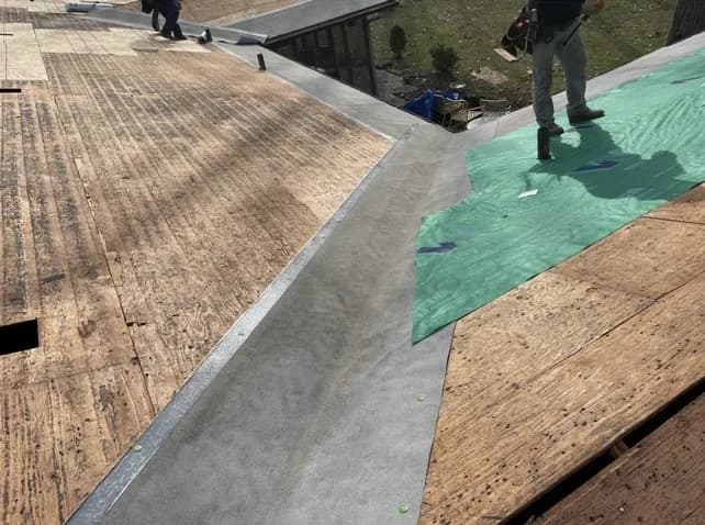 317 Restoration crew nailing architectural shingles to manufacturer pattern